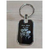 Ein wunderschöner Schlüsselanhänger graviert für die&nbsp;Beste Mama der Welt und Blumenmotiv