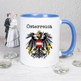 Geschenkidee für jeden der Österreich liebt. Der Österreich Adler auf auf einer weiß-blauen Kaffeetasse.