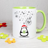 Tasse Weiß/Grün bedruckt mit Spruch: Life is a gift. - Motiv: Schneeflocken und Pinguin - Farbe Geschenk: Grün